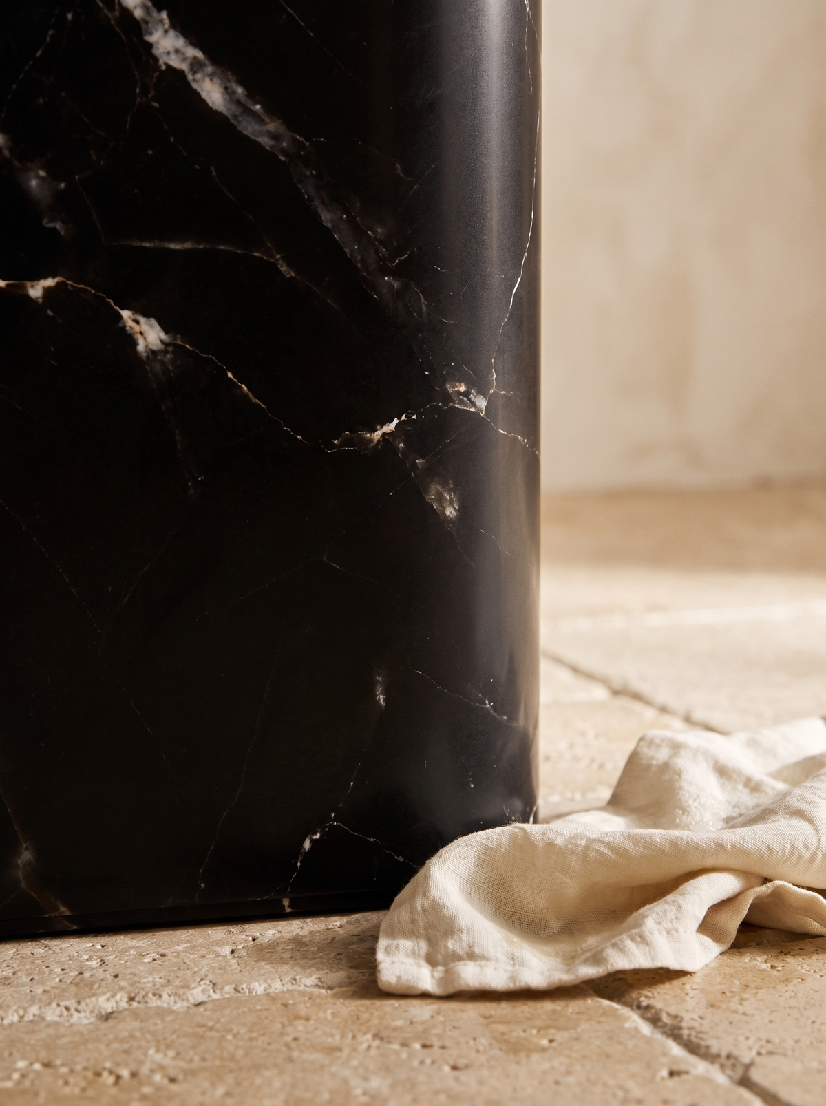 Carrera bin marble veining running through the finish